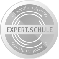 Logo Expert.Schule rund grauer Hintergrund Schriftzug EXPERT.SCHULE eEducation Austria